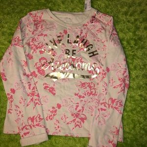 Children place sweat shirt